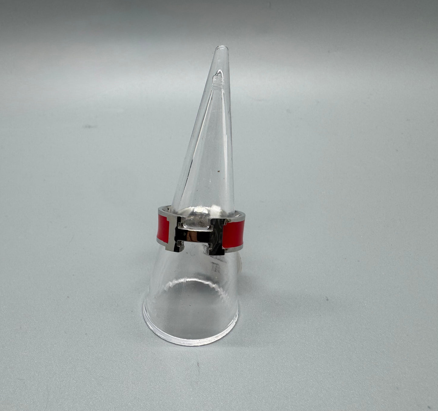 RING H RED AND SILVER